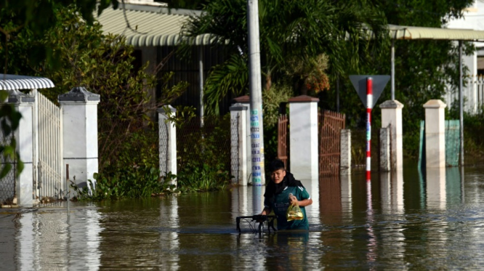 Flooding kills two as Vietnam hit by dozens of landslides