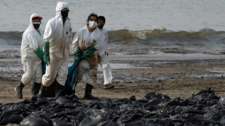Oil cleanup crews replace bathers on Peru beaches
