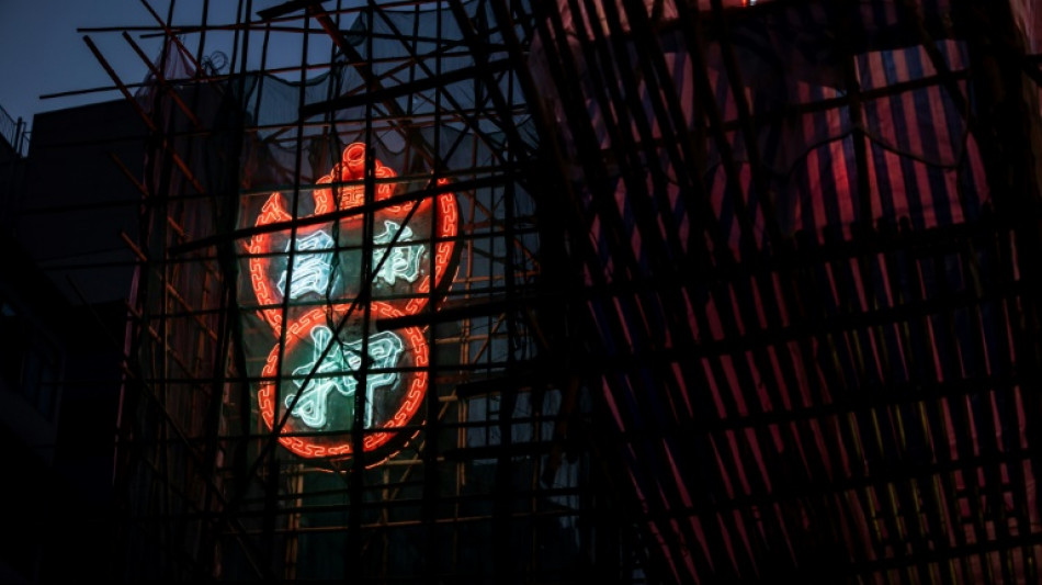 'Living gallery': fighting to save Hong Kong's fading neon signs