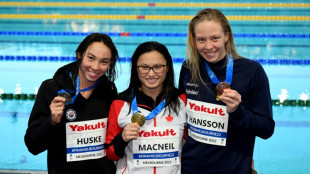 Maggie MacNeil establece un nuevo r&eacute;cord de 100 metros mariposa