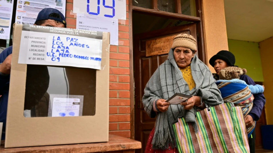Bolivians head to polls, looking to the right for economic salvation