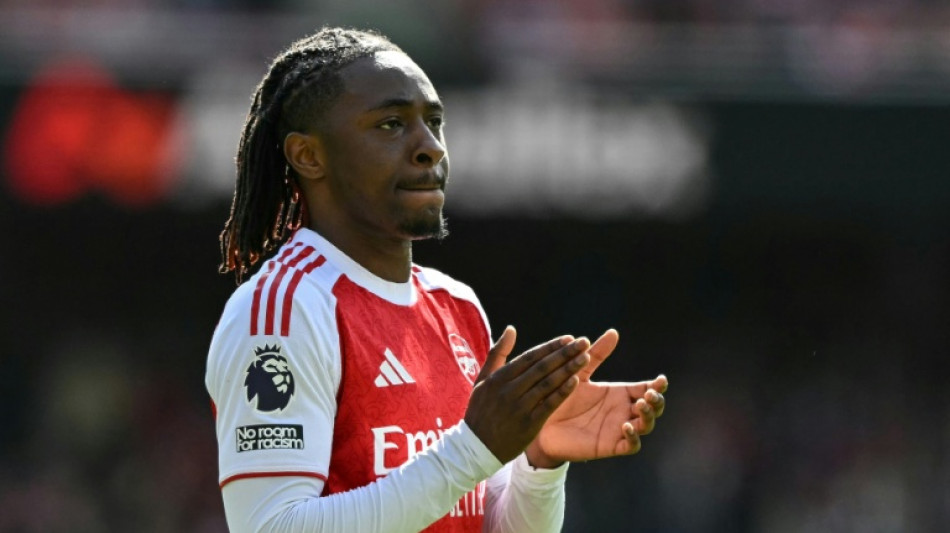 Arsenal suffer huge title blow as Liverpool earn vital win