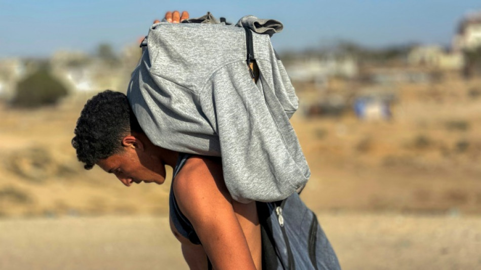 Thousands rush into new aid distribution centre in south Gaza