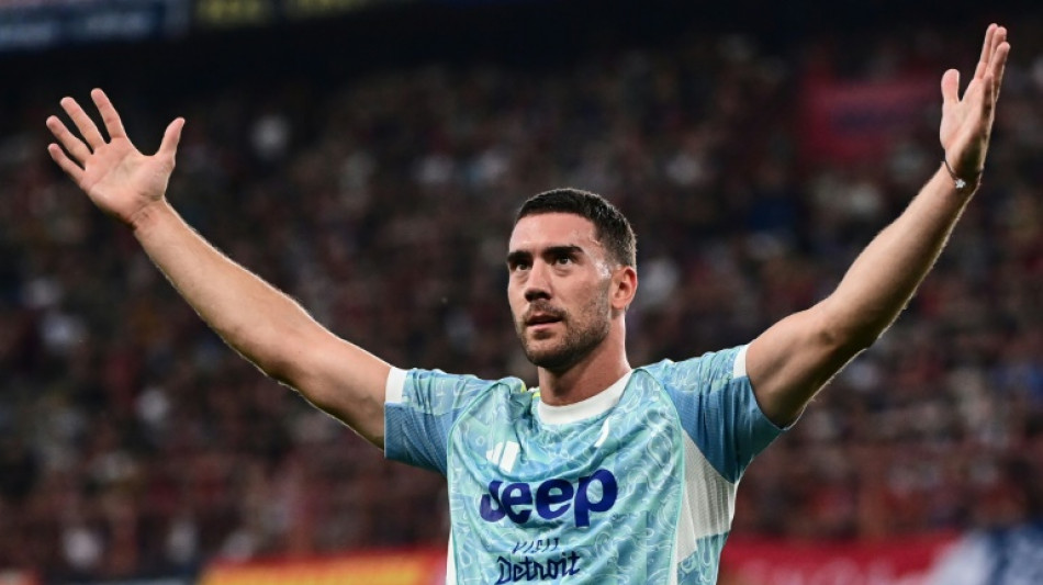 Defiant Vlahovic shoots Juventus to victory at Genoa