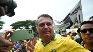Ailing Bolsonaro says he will 'probably' need surgery