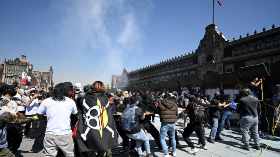 Clashes erupt in Mexico City anti-crime protests, injuring 120